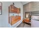 Bedroom wall unit with storage and mid-century modern design complements the room's decor at 125 Mirage View Dr, Henderson, NV 89011