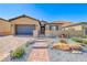 Inviting front yard with desert landscaping at 125 Mirage View Dr, Henderson, NV 89011