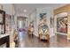 Hallway with attractive floors, leading to the front door and main living areas at 125 Mirage View Dr, Henderson, NV 89011