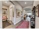Bright hallway with wood floors and gallery-style decor at 125 Mirage View Dr, Henderson, NV 89011