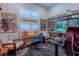 Well-lit home office featuring a collection of books, posters, and modern decor at 125 Mirage View Dr, Henderson, NV 89011