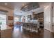 Modern kitchen with granite countertops, stainless steel appliances, and an island with bar seating at 125 Mirage View Dr, Henderson, NV 89011