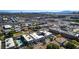 Bright aerial view of a property with a swimming pool and desert landscape in the surrounding neighborhood at 1309 Dorothy Ave # 4, Las Vegas, NV 89119