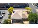 Aerial shot highlighting the home's roof and surrounding landscape with mature trees at 1309 Dorothy Ave # 4, Las Vegas, NV 89119