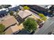 An aerial view of a home featuring mature trees and a well-maintained roof at 1309 Dorothy Ave # 4, Las Vegas, NV 89119