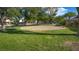 Image features a common area park with green grass and mature trees at 1309 Dorothy Ave # 4, Las Vegas, NV 89119