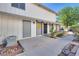 Home exterior featuring a well-maintained property with desert landscaping and individual entryways at 1309 Dorothy Ave # 4, Las Vegas, NV 89119