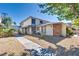 Beautiful home exterior showcasing a well-maintained yard with mature landscaping and walkways at 1309 Dorothy Ave # 4, Las Vegas, NV 89119