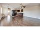 This spacious living room has beautiful hardwood floors and a kitchen view at 1309 Dorothy Ave # 4, Las Vegas, NV 89119