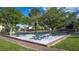 Outdoor picnic area features mature trees and green picnic tables, perfect for gatherings at 1309 Dorothy Ave # 4, Las Vegas, NV 89119