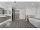 Large bathroom showcasing soaking tub, walk-in shower and vanity at 1316 Eagle Meadow Ct, Las Vegas, NV 89123