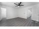 Bright bedroom with a ceiling fan and gray vinyl floor at 1316 Eagle Meadow Ct, Las Vegas, NV 89123