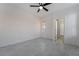 This bedroom has neutral walls, tiled flooring, and modern fixtures at 1316 Eagle Meadow Ct, Las Vegas, NV 89123