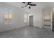 This bedroom has neutral walls, tiled flooring, and a closet at 1316 Eagle Meadow Ct, Las Vegas, NV 89123