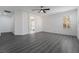 Large bedroom features laminate flooring, a ceiling fan, and an ensuite bathroom at 1316 Eagle Meadow Ct, Las Vegas, NV 89123