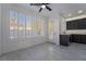 Sunlit eat-in kitchen with dark cabinets, stainless steel appliances, and lots of windows at 1316 Eagle Meadow Ct, Las Vegas, NV 89123