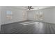 Bright living room with french doors and wood-look floors at 1316 Eagle Meadow Ct, Las Vegas, NV 89123