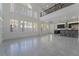 Spacious living room with high ceilings, lots of windows, and an open concept layout at 1316 Eagle Meadow Ct, Las Vegas, NV 89123