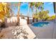 Backyard pool and spa with mature landscaping and desert scenery at 1316 Eagle Meadow Ct, Las Vegas, NV 89123