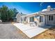 Home featuring a concrete patio and large windows offering scenic views and natural light at 1351 Fawn St, Pahrump, NV 89048