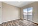 Bright bedroom with sliding glass doors leading to outdoor area and wood-look flooring at 150 N Las Vegas Blvd # 804, Las Vegas, NV 89101