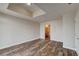 Bedroom showcasing wood floors, white trim, and access to ensuite bathroom at 150 N Las Vegas Blvd # 804, Las Vegas, NV 89101