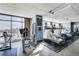 Bright community gym with workout machines and large window overlooking the city skyline at 150 N Las Vegas Blvd # 804, Las Vegas, NV 89101