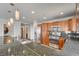 The modern kitchen includes stainless steel appliances, granite countertops, and wood cabinets with a breakfast bar at 150 N Las Vegas Blvd # 804, Las Vegas, NV 89101