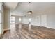 Spacious living area boasts modern wood-look flooring, neutral walls, and abundant natural light through large windows at 150 N Las Vegas Blvd # 804, Las Vegas, NV 89101