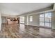 Spacious living area with wood floors and bright windows and the kitchen in the background at 150 N Las Vegas Blvd # 804, Las Vegas, NV 89101