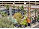 Aerial view of the complex featuring a pool, tall palms and street sign at 150 N Las Vegas Blvd # 804, Las Vegas, NV 89101