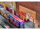 Street level image of public transportation vehicles parked alongside a building featuring neon signs at 150 N Las Vegas Blvd # 804, Las Vegas, NV 89101