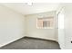 Bedroom featuring neutral walls, closet, and carpeted floors at 1724 Navajo Lake Way, Las Vegas, NV 89128