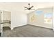 Main bedroom with vaulted ceiling, ceiling fan, and a view at 1724 Navajo Lake Way, Las Vegas, NV 89128