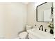 Powder room with modern fixtures and marble vanity at 1724 Navajo Lake Way, Las Vegas, NV 89128