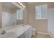 Bright bathroom with double sinks, a large mirror, and a shower-tub combination at 1812 Relate Ct, Las Vegas, NV 89117