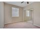 Cozy bedroom with mirrored closet doors, neutral walls, and plush carpeting at 1812 Relate Ct, Las Vegas, NV 89117