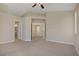 Spacious main bedroom featuring neutral colors, plush carpeting, and abundant natural light at 1812 Relate Ct, Las Vegas, NV 89117