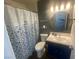 Bathroom featuring a coordinated shower curtain and vanity at 1841 Skywood Way, Las Vegas, NV 89142