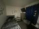 Bedroom is styled with modern decor and features a mounted TV at 1841 Skywood Way, Las Vegas, NV 89142