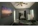 Main bedroom featuring ample closet space, modern art and ample sunlight at 1841 Skywood Way, Las Vegas, NV 89142