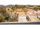 Expansive aerial view showcasing the home's proximity to the golf course and surrounding neighborhood at 1933 Davina St, Henderson, NV 89074
