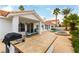 Backyard with a built-in grill, sink, swimming pool, and spa at 1933 Davina St, Henderson, NV 89074