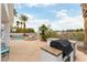 Backyard featuring a swimming pool, spa, grill and covered patio at 1933 Davina St, Henderson, NV 89074