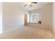 Comfortable bedroom with natural light, window seat, and ample storage space at 1933 Davina St, Henderson, NV 89074