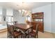 Elegant dining room with classic furniture and a chandelier, perfect for formal gatherings at 1933 Davina St, Henderson, NV 89074