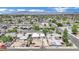 Neighborhood aerial view with blue sky, mountains in the distance, and residential homes at 2016 Linden Ave, Las Vegas, NV 89101