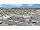 Overhead shot of commercial real estate features ample parking, retail space, and a view of the surrounding community at 2016 Linden Ave, Las Vegas, NV 89101