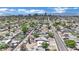 Expansive aerial view of the residential neighborhood with a downtown skyline and mountain range in the background at 2016 Linden Ave, Las Vegas, NV 89101