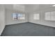 Bedroom with windows, carpet, and neutral walls, perfect for relaxation at 2016 Linden Ave, Las Vegas, NV 89101